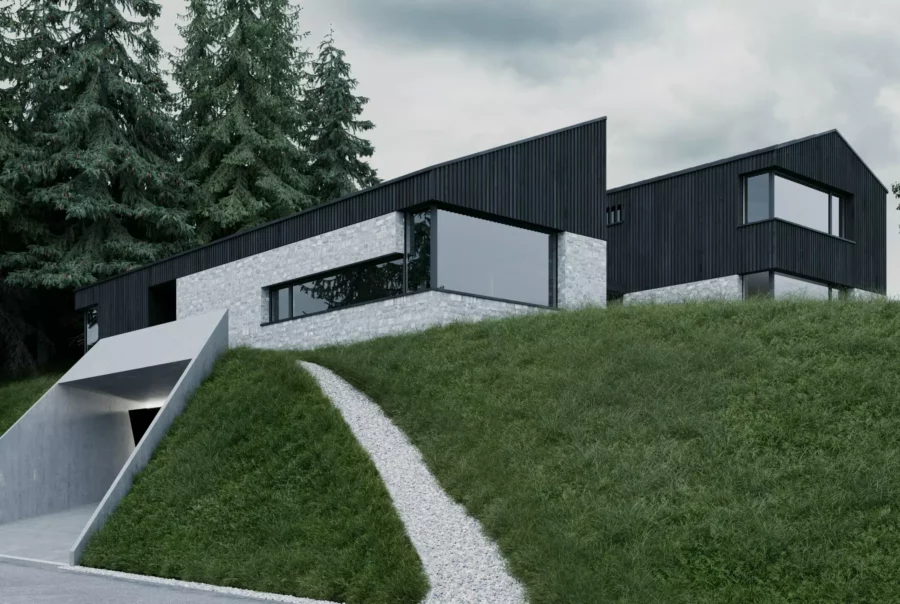 Modernes Einfamilienhaus mit schwarzer Holzfassade und Natursteinmauerwerk auf einem grünen Hang im Tennengau bei bewölktem