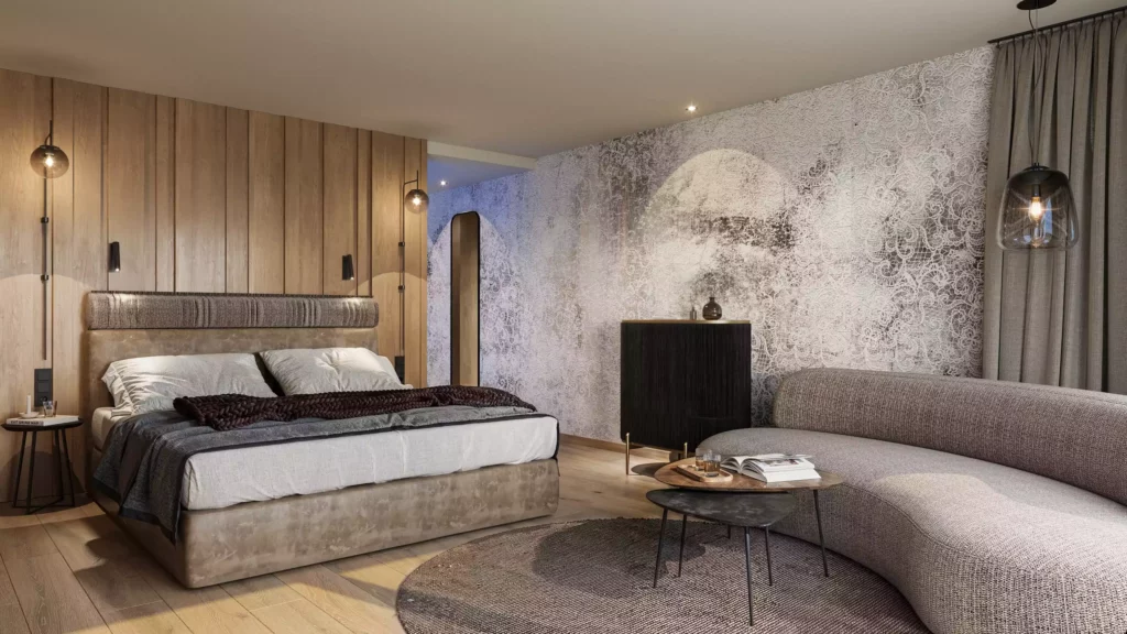 Hotel Berghof_06 Modern eingerichtetes Hotelzimmer mit großem Bett, runder Couch, Holzverkleidung und dekorativer Wandgestaltung im Hotel