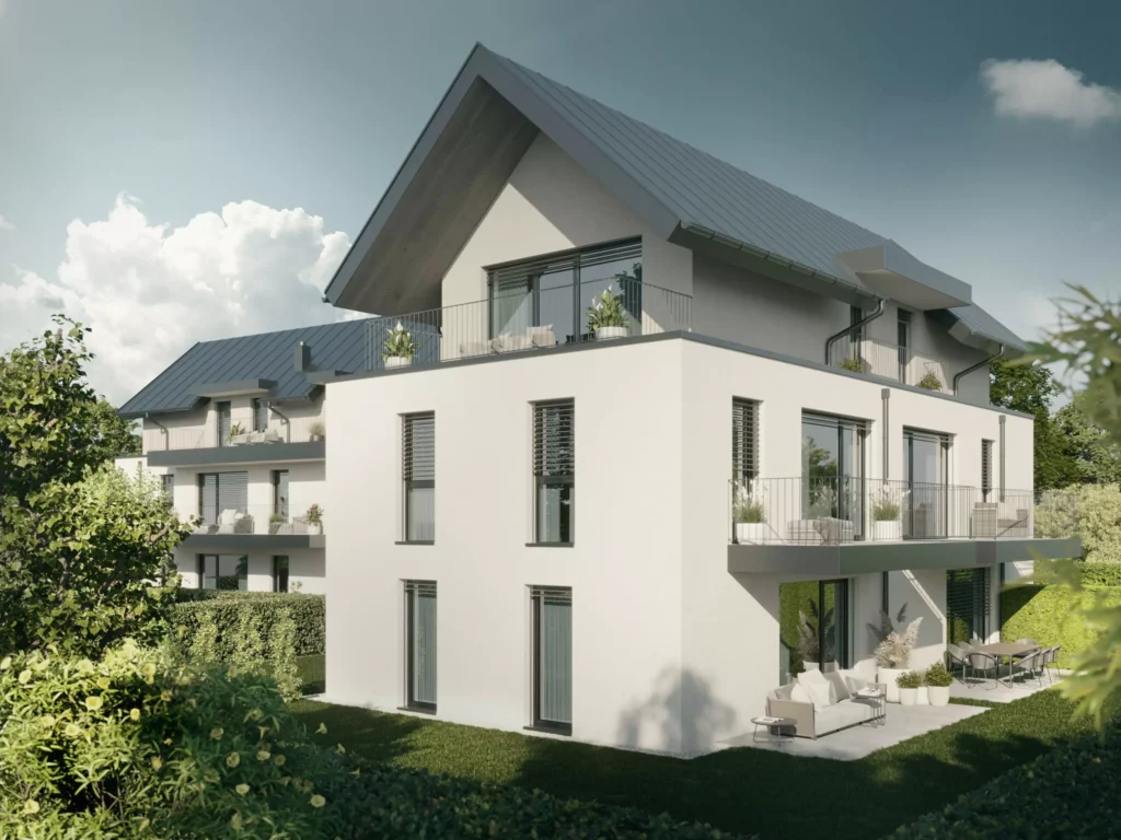 deutinger-projektentwicklung-baumanagement-generalunternehmen-immobilien-salzburg-projekt-wohn-traum bluntaustrasse-golling-01-neu Modernes Wohngebäude mit Balkonen und Terrasse, umgeben von Grünflächen und Hecken, unter bewölktem Himmel im November