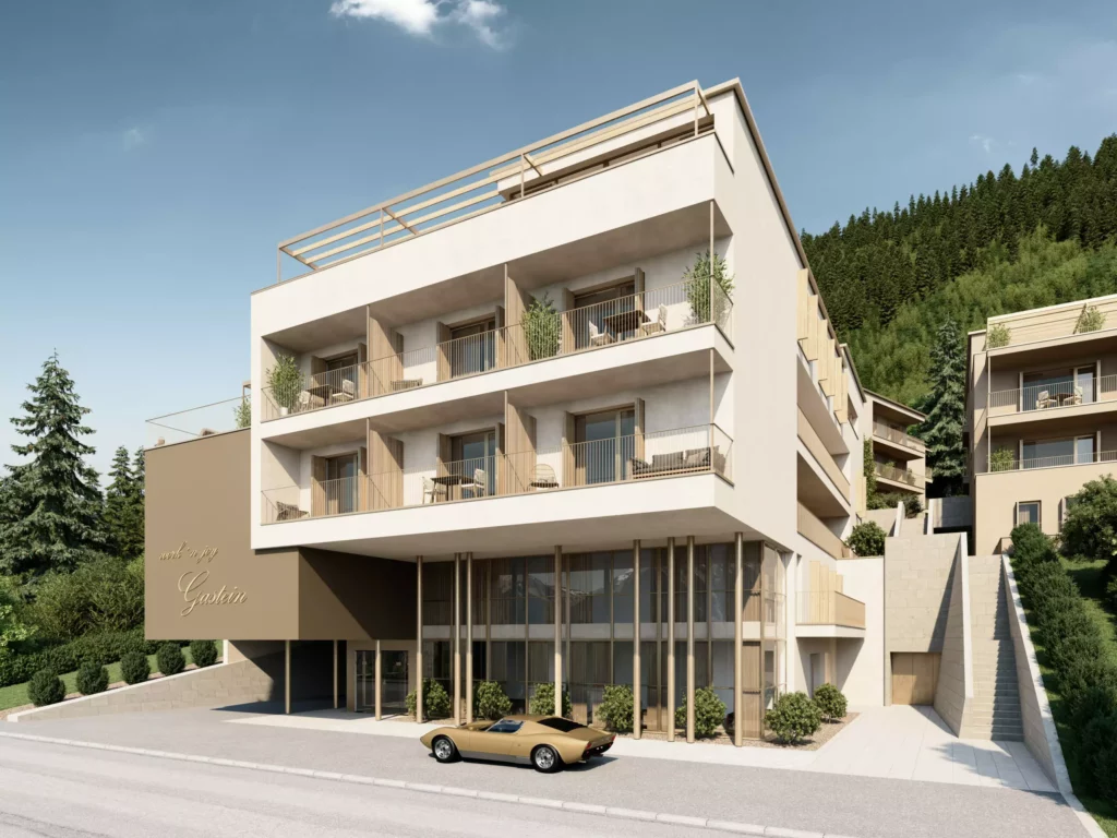 Wohnpark_Gastein (2) Moderner Wohnpark Gastein mit Balkonen, Terrasse, Eingangsbereich und einem Oldtimer-Pkw vor dem Gebäude am Hang mit Wald im
