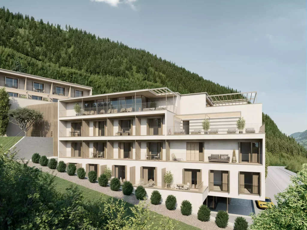 Wohnpark_Gastein (5) Moderner Wohnpark mit Balkonen und Terrasse am Hang vor bewaldetem Berg in Gastein, Bauprojektmanagement sichtbar