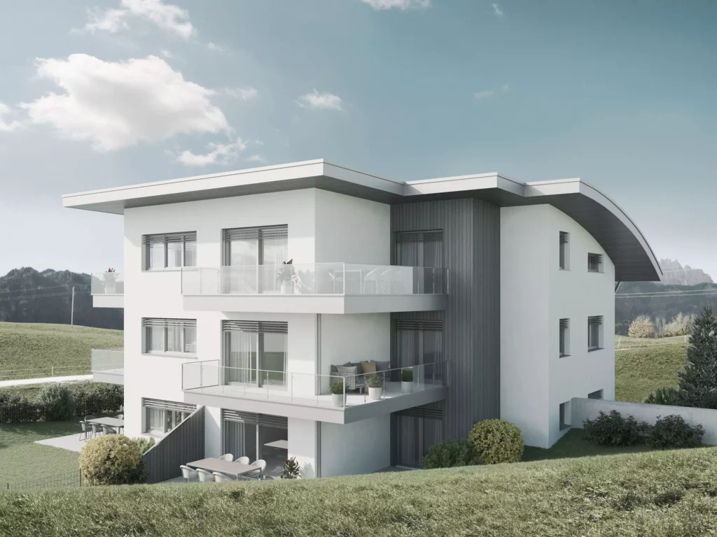 deutinger-projektentwicklung-baumanagement-generalunternehmen-immobilien-salzburg-projekt-mountainview-alpendorf-Kamera02 Modernes dreistöckiges Wohngebäude mit Balkonen und Glasgeländern vor Berglandschaft bei klarem Himmel in Alpendorf