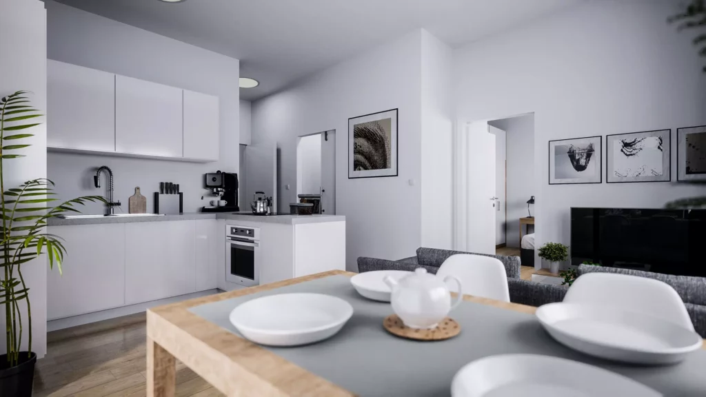 deutinger-projektentwicklung-baumanagement-generalunternehmen-immobilien-salzburg-projekt-mountainview-alpendorf-Kueche-Wohnraum-Top-5 Moderner offener Wohnraum mit weißer Küche, Esstisch mit Geschirr und stilvoller Einrichtung in Salzburg Mountainview