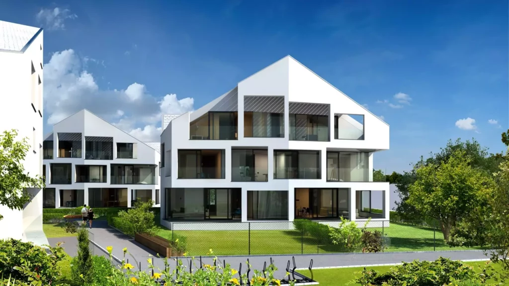 deutinger-projektentwicklung-baumanagement-generalunternehmen-immobilien-salzburg-wohpark-fischergasse-02 Moderne Wohngebäude mit großen Fenstern und Gärten im Wohnpark Fischergasse Salzburg bei klarem Himmel