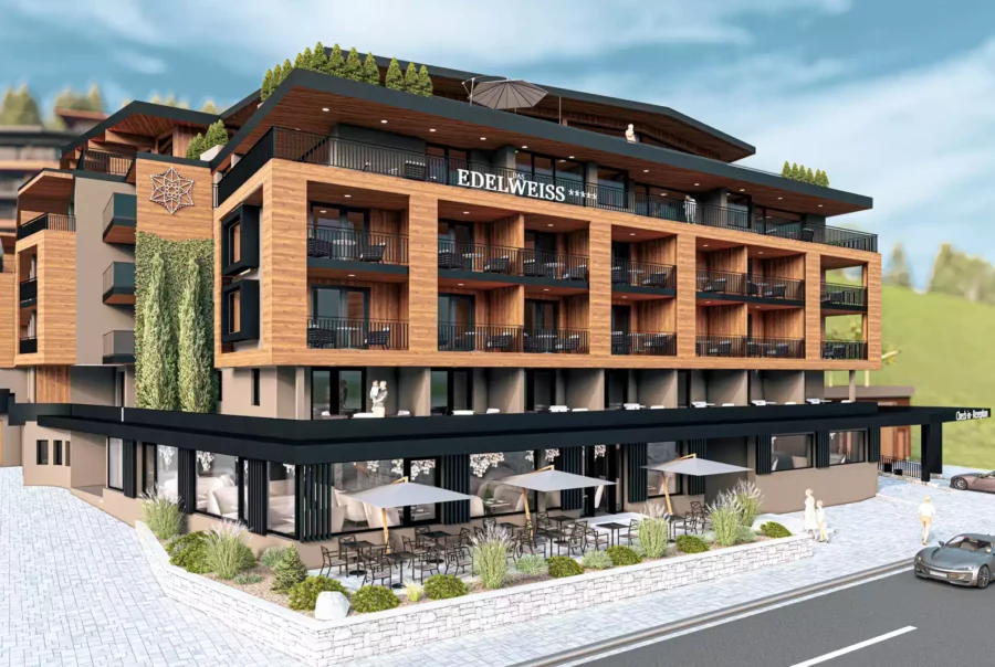 Modernes Hotelgebäude mit Holzfassade, Balkonen, Außenterrasse mit Sonnenschirmen und Autos vor der Einfahrt