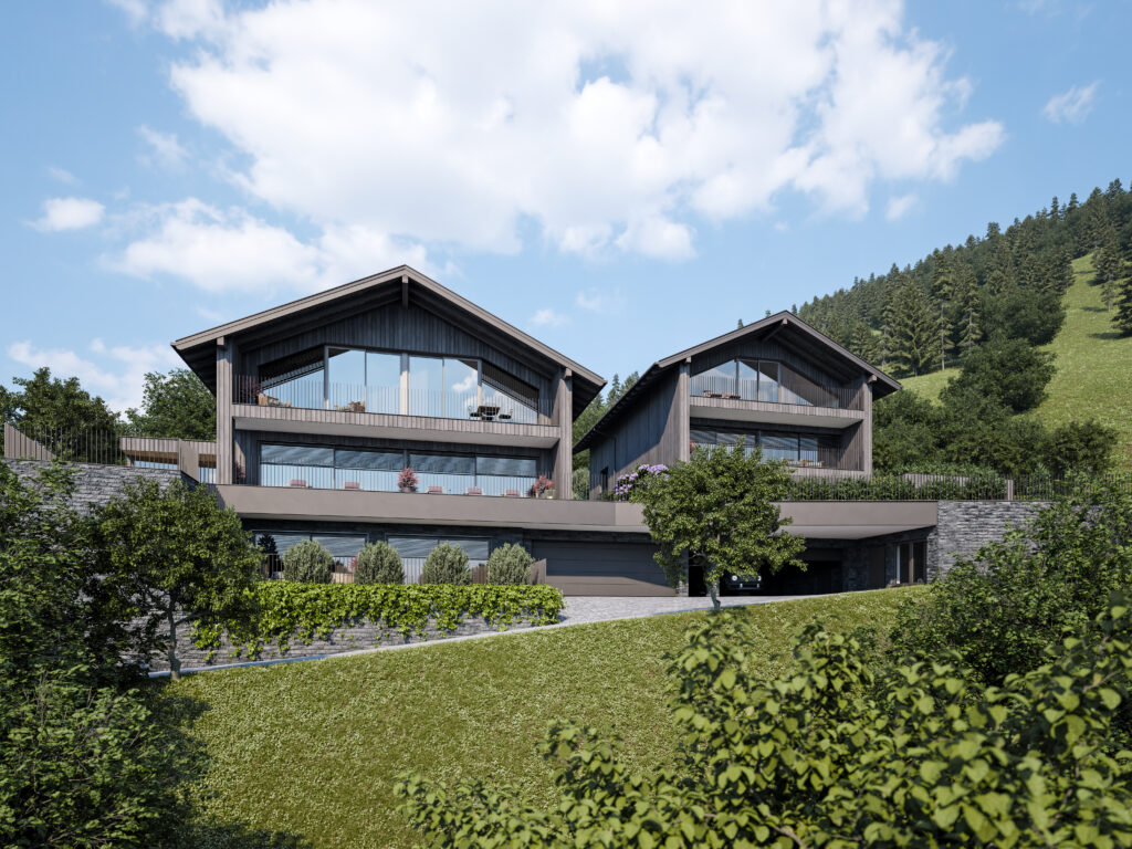 Modernes Chalet mit großen Glasfronten und Terrasse in grüner Berglandschaft bei St. Johann im Pongau