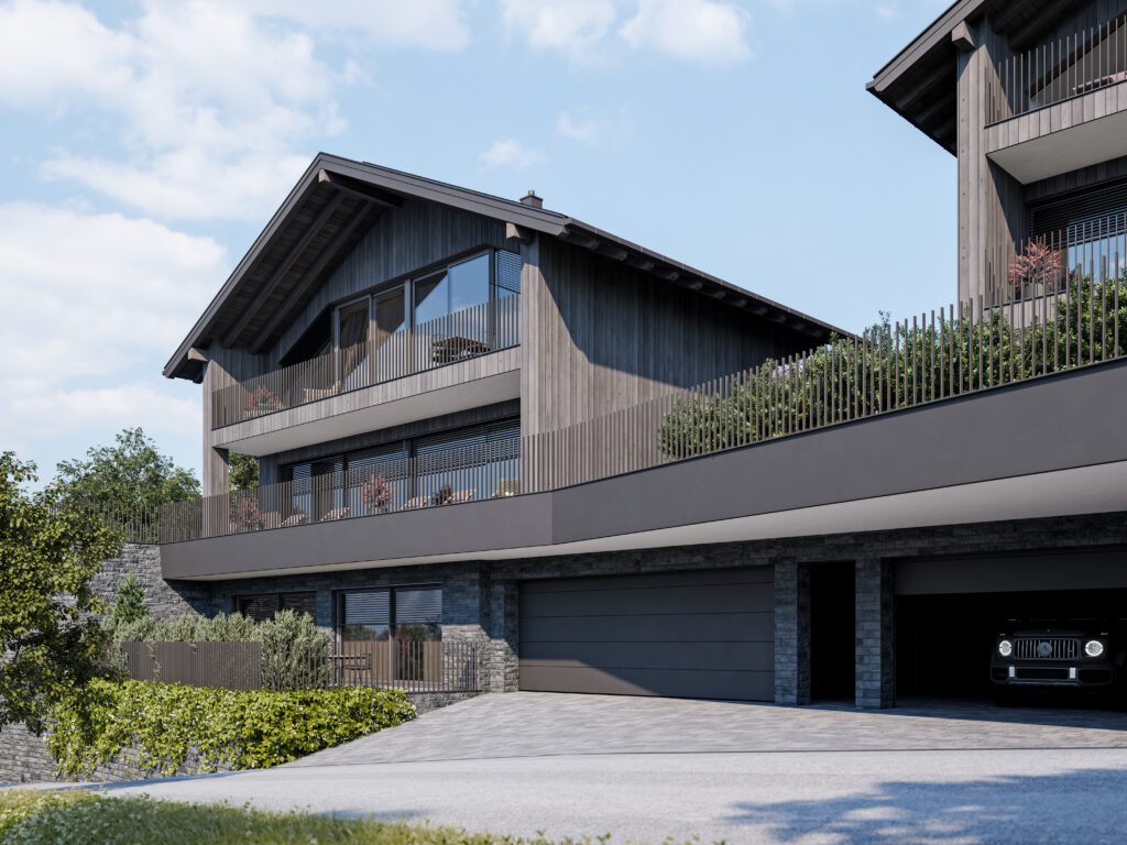 chalet-st-johann-im-pongau-aussenansicht-mit-garage Modernes Chalet in St. Johann im Pongau mit Garage und Holzfassade, umgeben von Grün und klarem Himmel