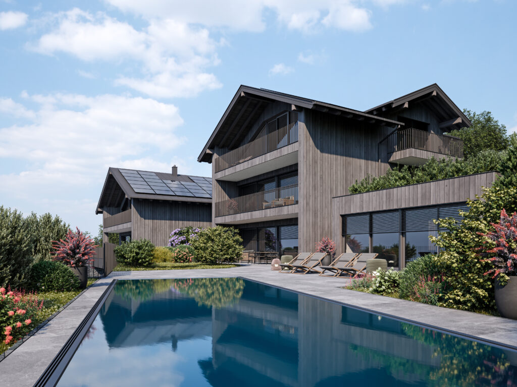 chalet-st-johann-im-pongau-aussenansicht mit pool Modernes Chalet in St. Johann im Pongau mit großem Pool und umliegender Gartenanlage bei klarem Himmel