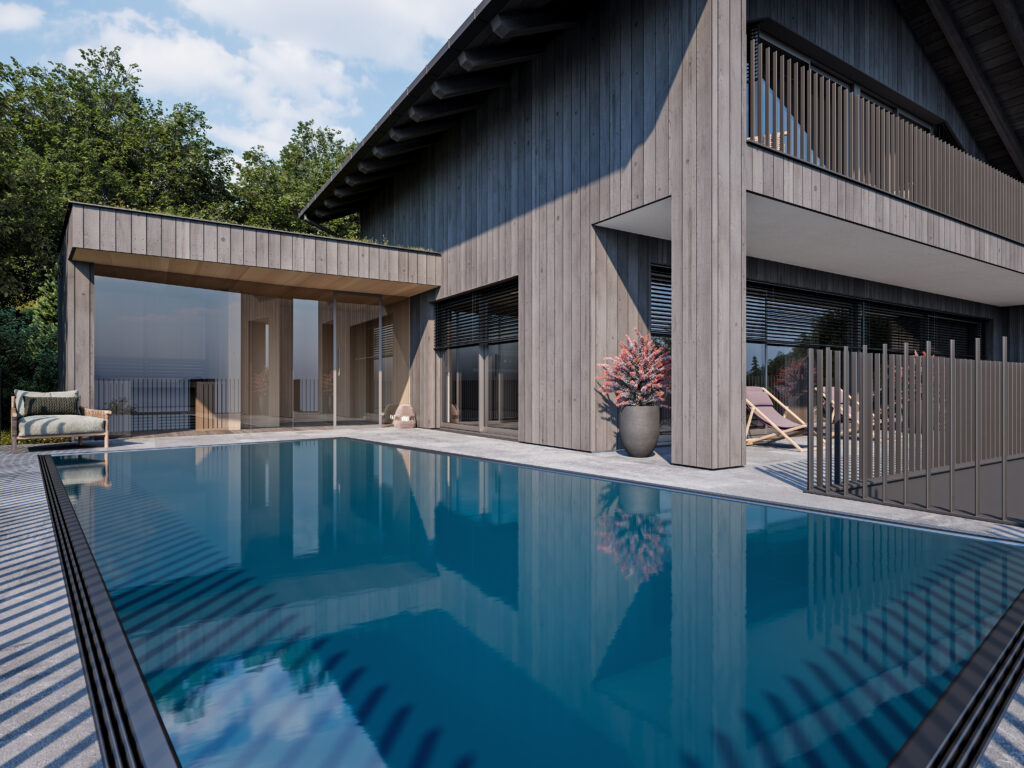 chalet-st-johann-im-pongau-aussenansicht-pool Modernes Chalet in St. Johann im Pongau mit großem Außenpool und Holzfassade in sonniger Lage