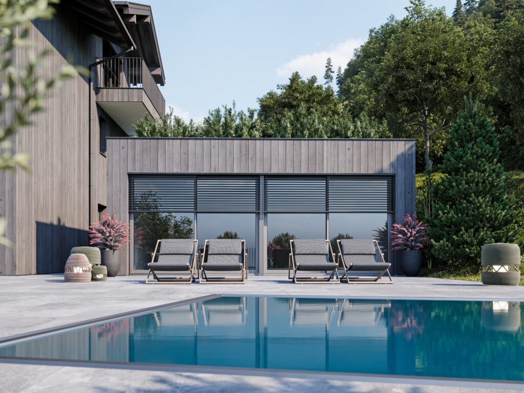 chalet-st-johann-im-pongau-aussenansicht-pool-mit-liegebereich Modernes Chalet in St. Johann im Pongau mit Außenpool und Liegebereich umgeben von Bäumen und Naturkulisse