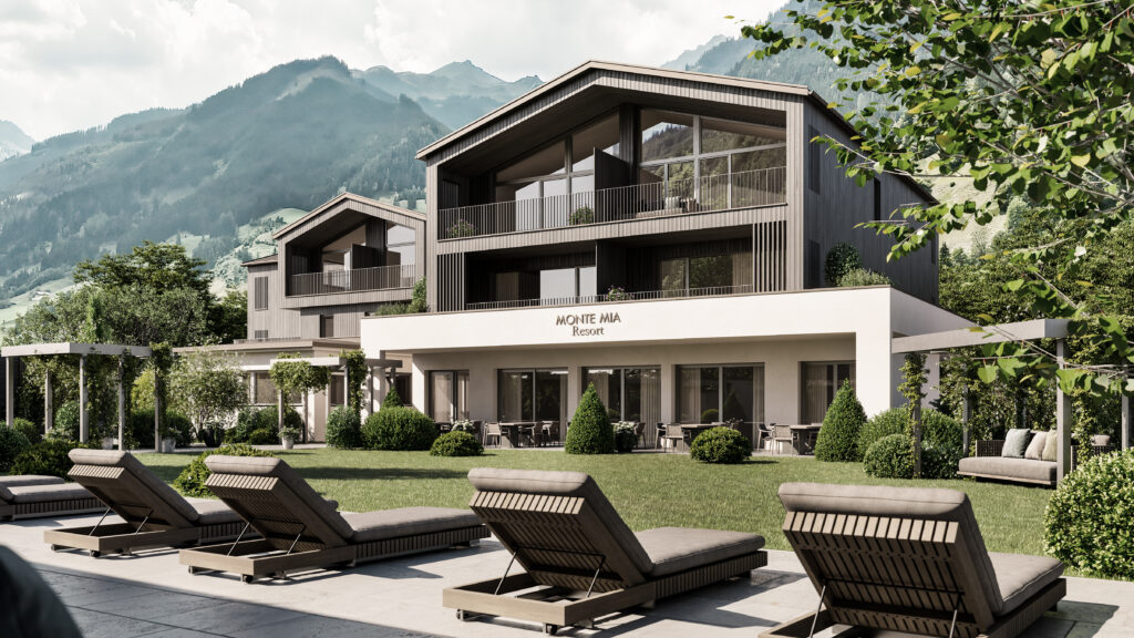 Außenansicht des Monte Mia Resorts in Großarl mit moderner Architektur, Garten, Liegestühlen und Bergkulisse