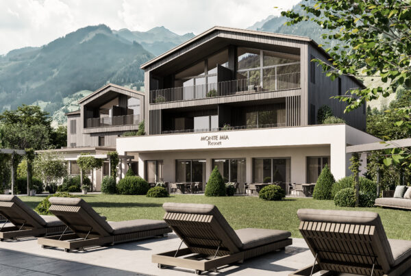 Außenansicht des Monte Mia Resorts in Großarl mit moderner Architektur, Garten, Liegestühlen und Bergkulisse